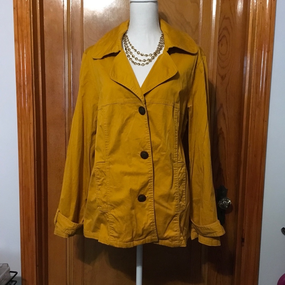 Beautiful mustard colored jacket or top